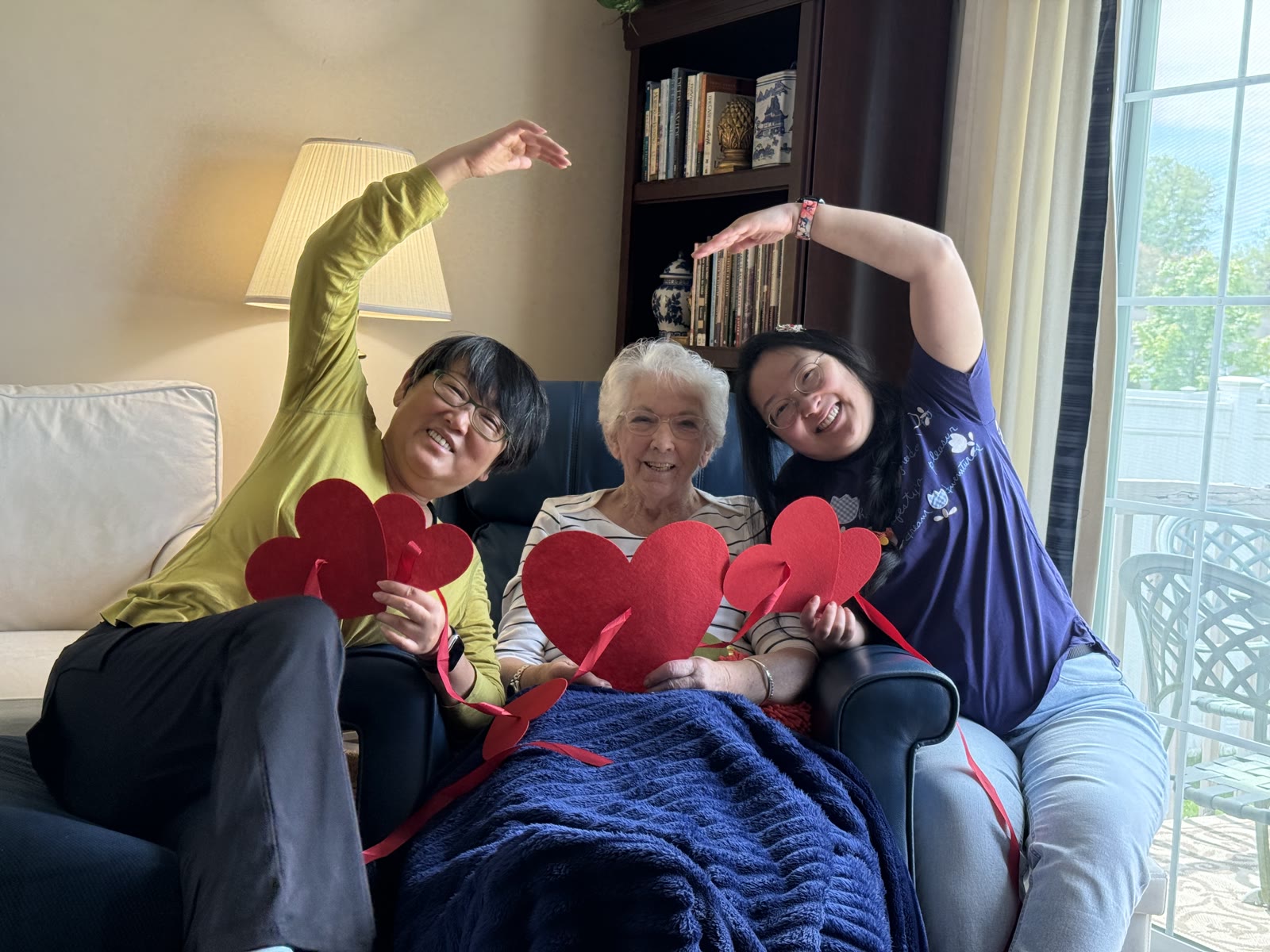 Three generations: Beth, Eliza, Jessica with red hearts