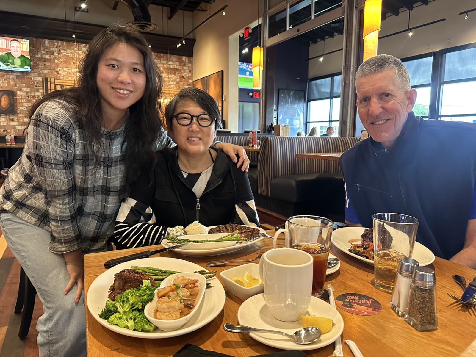 Bud treating Eliza and Pi-chu to a meal in Dallas